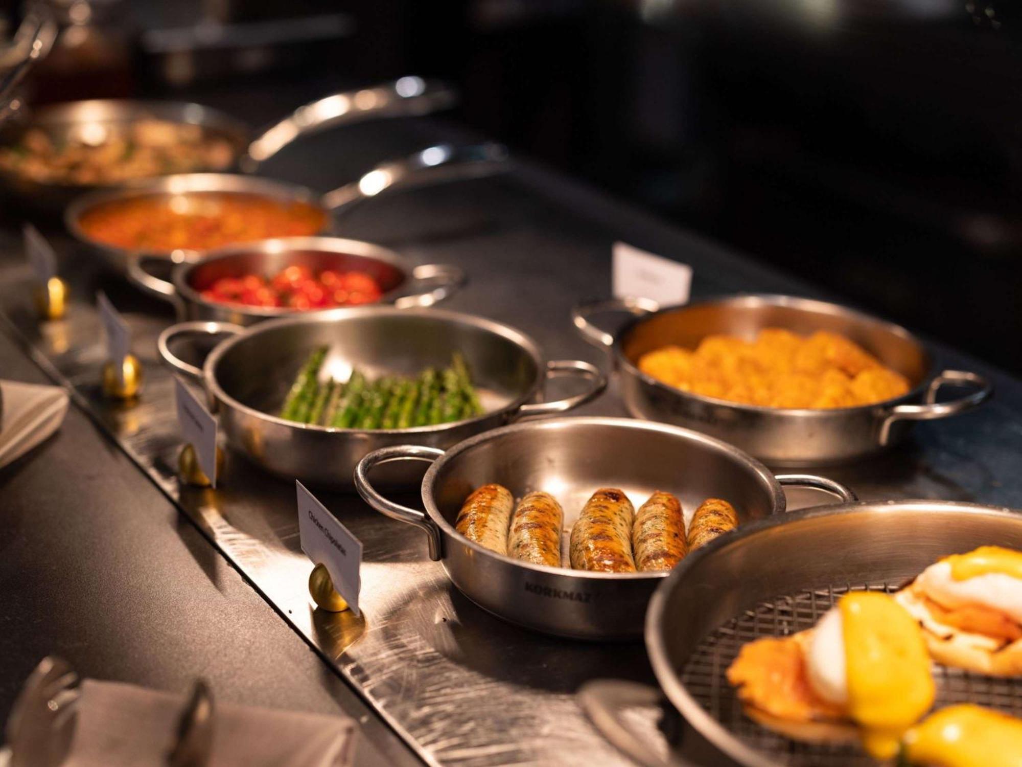 The Playford Adelaide - Mgallery Exterior foto A selection of prepared foods at a buffet